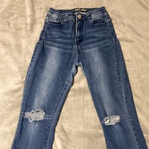Women’s bootcut jeans with holes in knees
